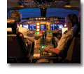 Photo of pilots in the cockpit of a Boeing 747-400