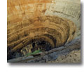 Photo of large excavated abandoned diamond pit