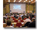 Photo of the seminar attendees watching a presentation