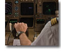 Photo of a pilot at the controls of a Boeing 747
