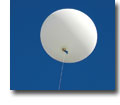 Photo of a weather ballon in the sky