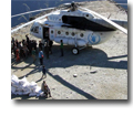 Photo of WFP helicopter delivering needed supplies