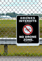 Image of drone restriction zone sign at a Canadian airport