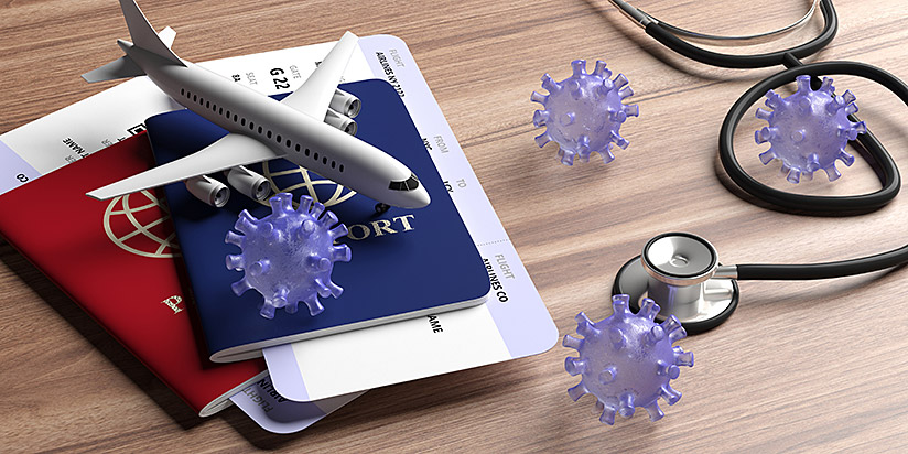 Photo of coronavirus models, passports, an airplane and a stethoscope .